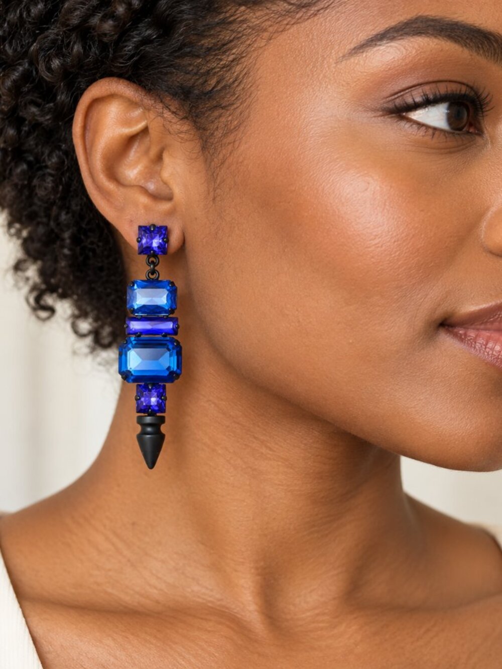 nOir Blue & Purple Crystal Drop Earrings with Black Spike Tips